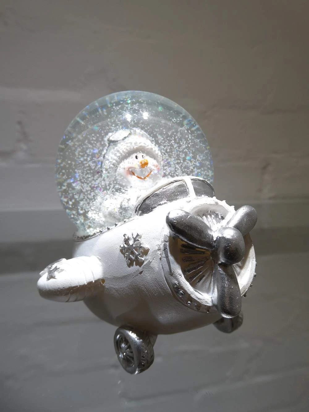 Small Christmas Plane Snow Globe with Snowman | Washington Lighting and Interiors Small Christmas Plane Snow Globe with Snowman | Washington Lighting and Interiors