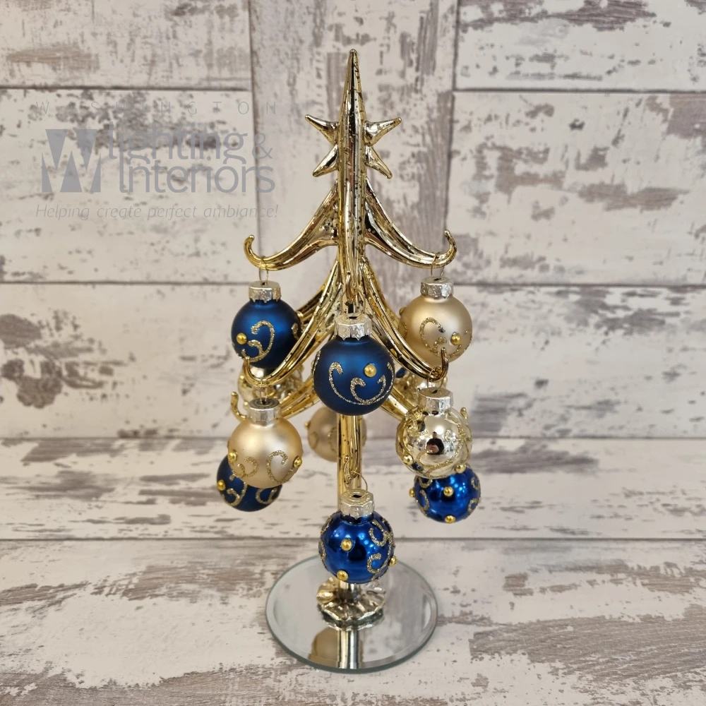 Detailed Gold Christmas Tree with Blue and Gold Baubles | Washington Lighting and Interiors Detailed Gold Christmas Tree with Blue and Gold Baubles | Washington Lighting and Interiors